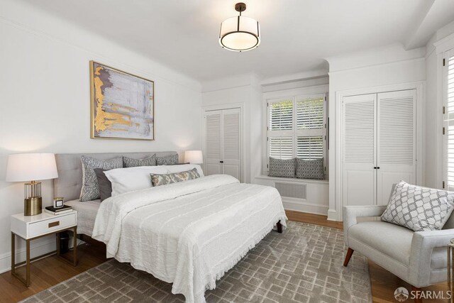 1998 Vallejo St Unit 2, San Francisco, CA 94123 - bedroom with multiple closets and wood finished floors