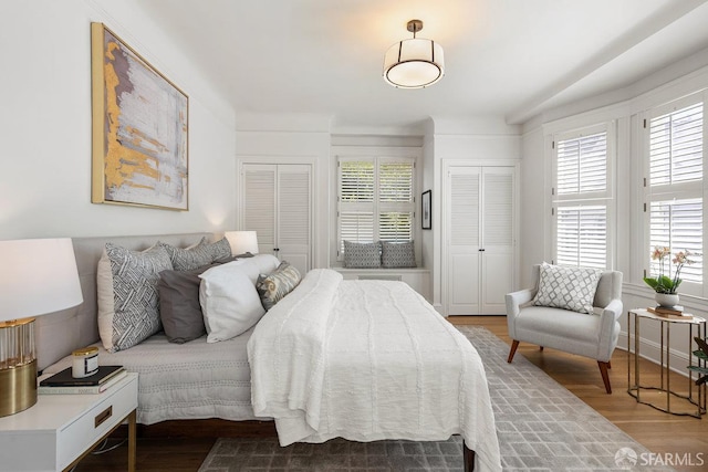 1998 Vallejo St Unit 2, San Francisco, CA 94123 - bedroom featuring multiple closets and light wood-style flooring