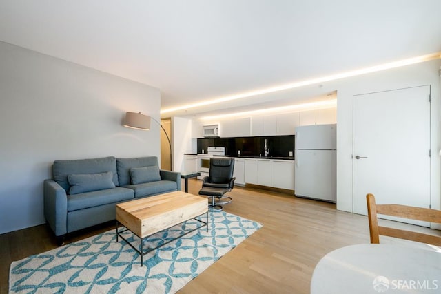 2000 Ellis St Unit 201, San Francisco, CA 94115 - living area featuring light wood-style flooring