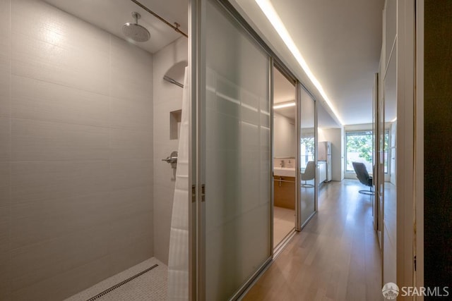2000 Ellis St Unit 201, San Francisco, CA 94115 - hall featuring light wood-style floors and a wall of windows