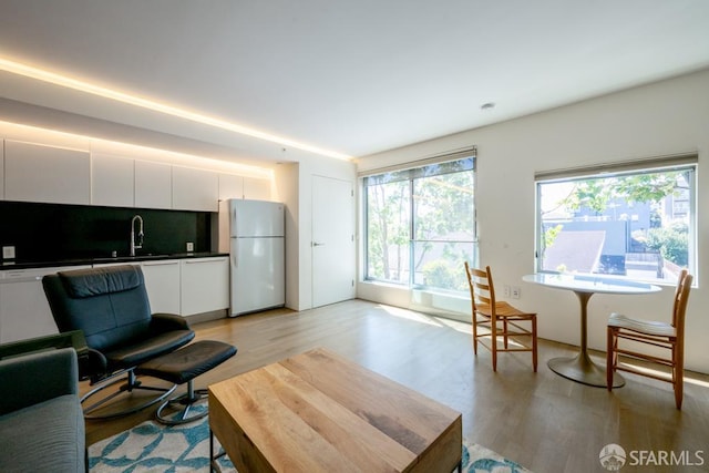 2000 Ellis St Unit 201, San Francisco, CA 94115 - living area featuring light wood finished floors
