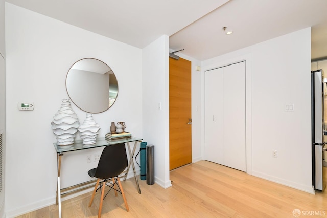 home office featuring hardwood / wood-style floors