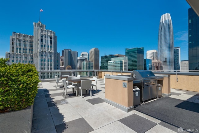 view of patio / terrace featuring an outdoor kitchen and area for grilling