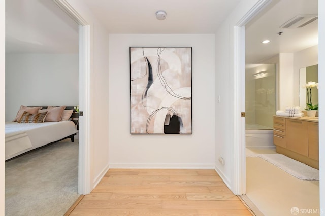 hallway featuring light hardwood / wood-style floors