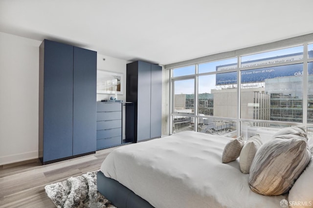 bedroom featuring light hardwood / wood-style floors