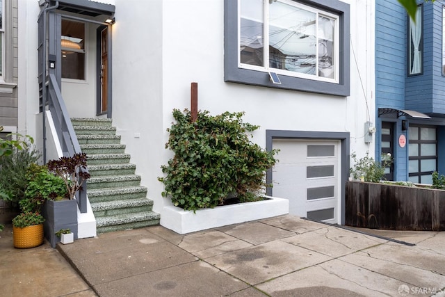 entrance to property with a garage