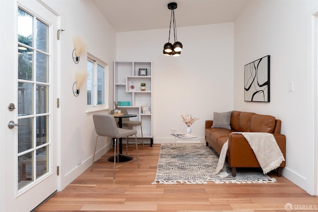 sitting room with light hardwood / wood-style flooring