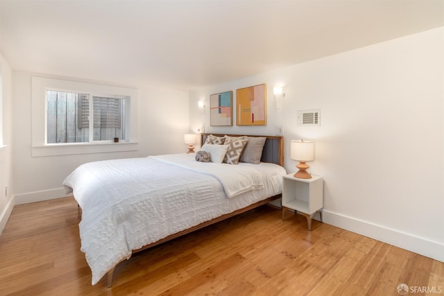 bedroom featuring light hardwood / wood-style flooring