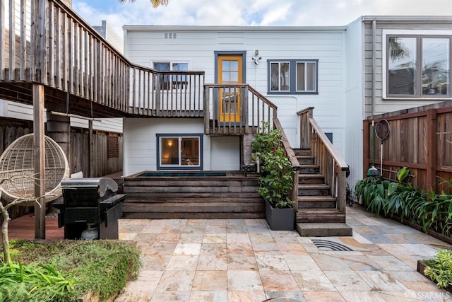 back of house featuring a patio