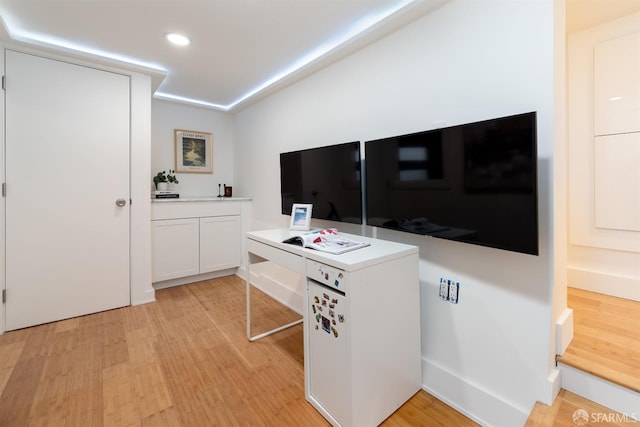 home office featuring light hardwood / wood-style floors