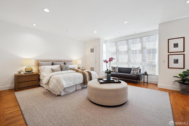 bedroom featuring hardwood / wood-style flooring