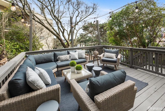 deck with an outdoor hangout area