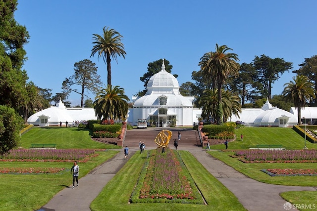 view of home's community with a lawn