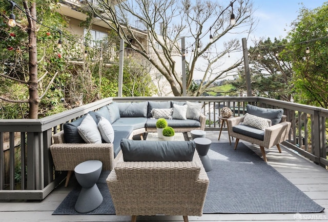 deck featuring an outdoor living space