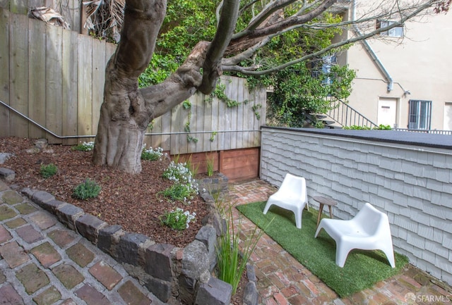 view of yard featuring fence