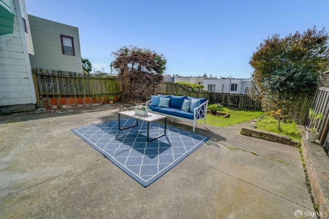 view of patio with a fenced backyard and an outdoor hangout area