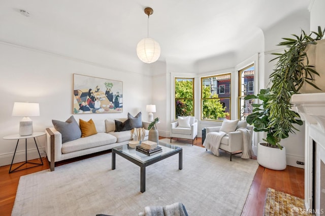 670 Page St, San Francisco, CA 94117 - living area with wood finished floors and a fireplace with flush hearth