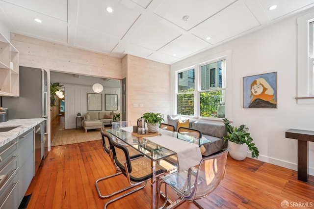 670 Page St, San Francisco, CA 94117 - dining room with light wood-style flooring, recessed lighting, and wood walls