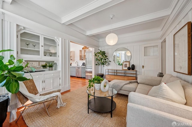 670 Page St, San Francisco, CA 94117 - living room featuring ornamental molding, beam ceiling, and light wood-type flooring