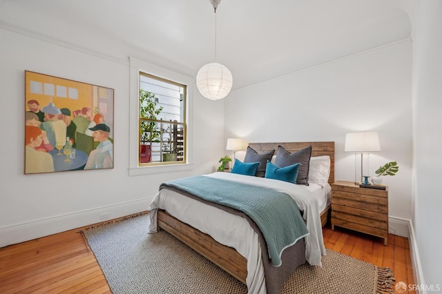670 Page St, San Francisco, CA 94117 - bedroom featuring wood finished floors and baseboards