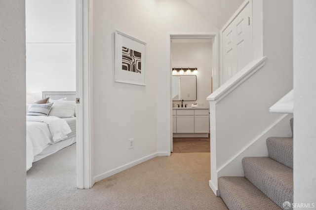 1805 Fillmore St Unit 302, San Francisco, CA 94115 - hall with carpet flooring, stairway, lofted ceiling, baseboards, and a sink