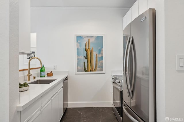 1805 Fillmore St Unit 302, San Francisco, CA 94115 - kitchen featuring stainless steel appliances, a sink, baseboards, white cabinets, and light countertops