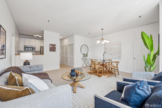 1805 Fillmore St Unit 302, San Francisco, CA 94115 - carpeted living room with a chandelier, baseboards, and recessed lighting