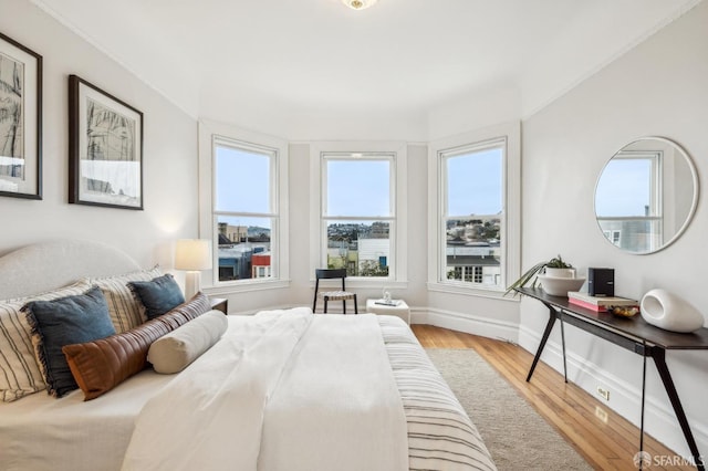 bedroom featuring light hardwood / wood-style floors