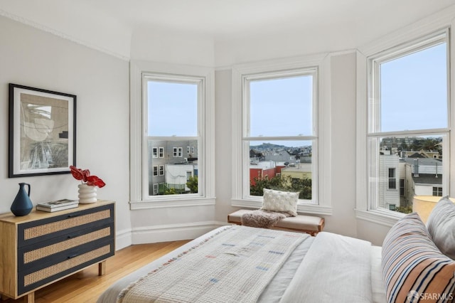 bedroom featuring wood-type flooring