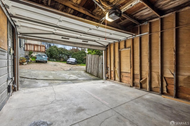 garage featuring a garage door opener