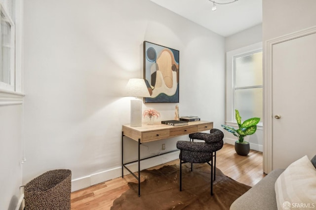 office with hardwood / wood-style floors