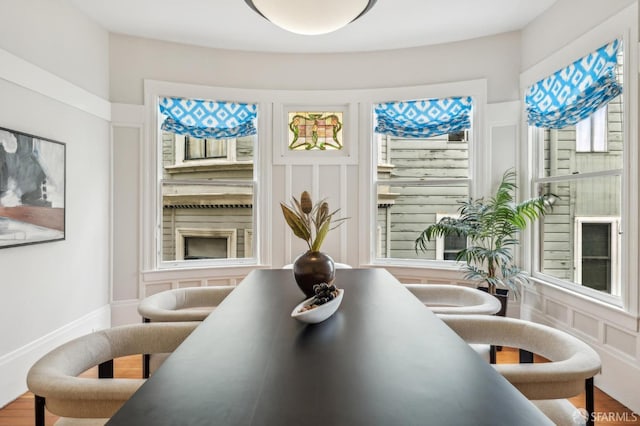 dining area featuring hardwood / wood-style floors