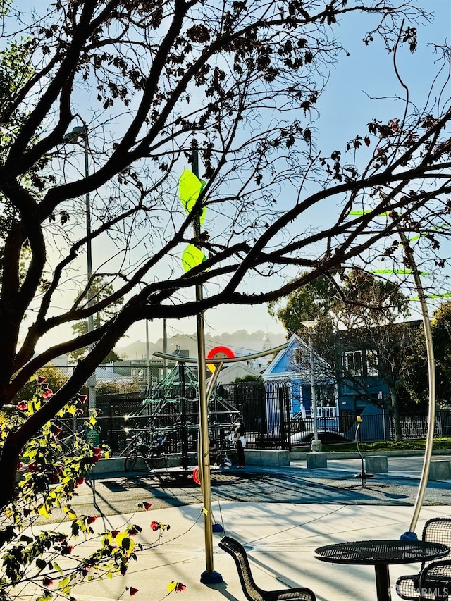 2553 Folsom St Unit A, San Francisco, CA 94110 - view of asphalt street with curbs, sidewalks, and traffic signs