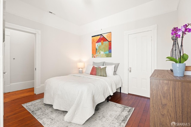 2553 Folsom St Unit A, San Francisco, CA 94110 - bedroom with dark wood-style flooring and baseboards