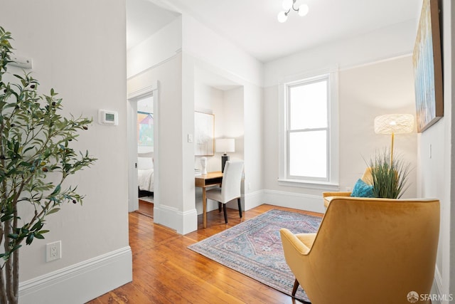 2553 Folsom St Unit A, San Francisco, CA 94110 - living area featuring wood-type flooring and baseboards