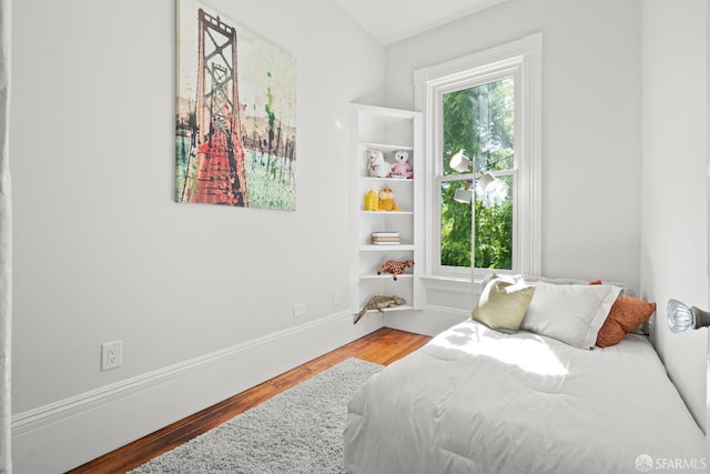 2553 Folsom St Unit A, San Francisco, CA 94110 - bedroom featuring wood finished floors and baseboards