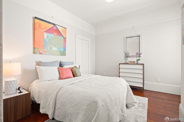 2553 Folsom St Unit A, San Francisco, CA 94110 - bedroom featuring dark wood-type flooring and baseboards