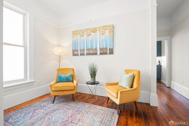 2553 Folsom St Unit A, San Francisco, CA 94110 - sitting room featuring wood finished floors, decorative columns, and baseboards