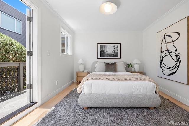 803 Vermont St, San Francisco, CA 94107 - bedroom featuring crown molding, light wood-style flooring, and access to exterior