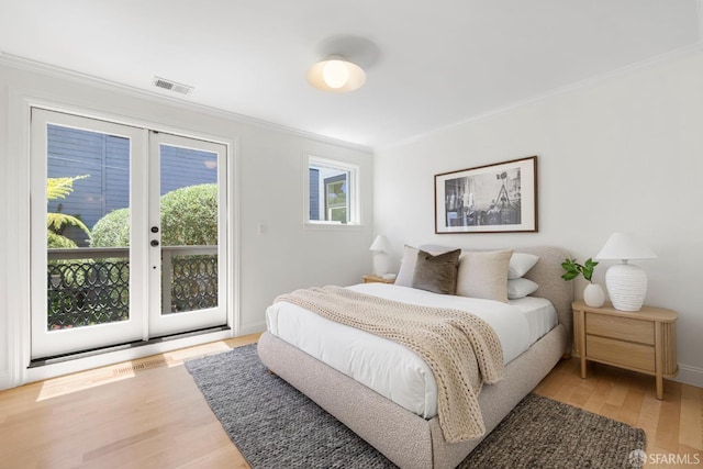 803 Vermont St, San Francisco, CA 94107 - bedroom featuring crown molding, access to exterior, and light wood finished floors