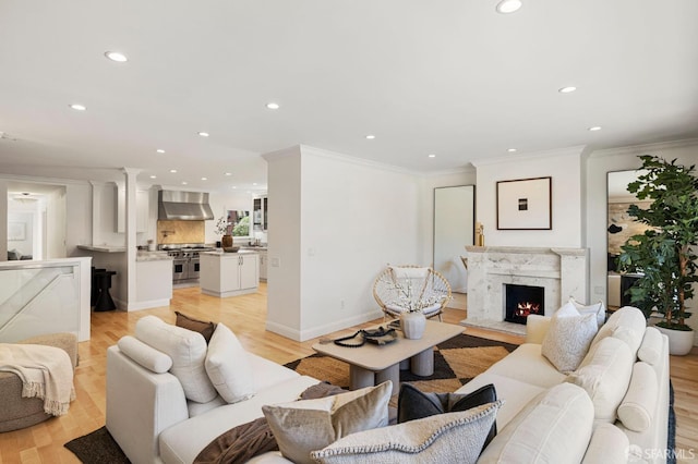 803 Vermont St, San Francisco, CA 94107 - living room featuring recessed lighting, crown molding, light wood-type flooring, and a premium fireplace