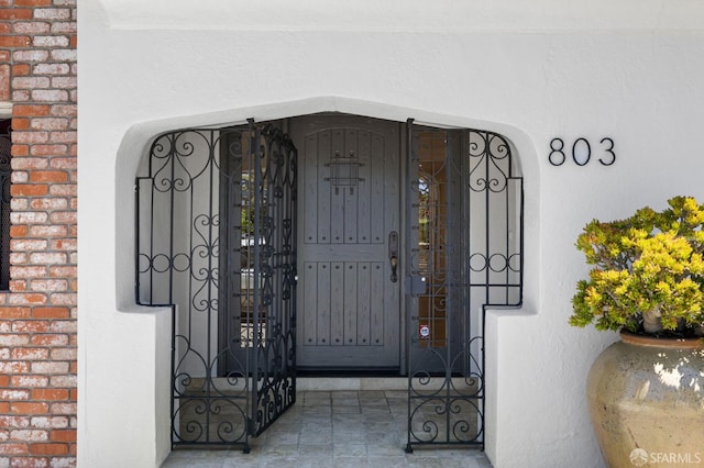 803 Vermont St, San Francisco, CA 94107 - entrance to property featuring a gate, brick siding, and stucco siding