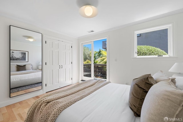 803 Vermont St, San Francisco, CA 94107 - bedroom featuring access to outside, wood finished floors, ornamental molding, and a closet