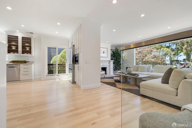 803 Vermont St, San Francisco, CA 94107 - living room featuring crown molding, light wood-type flooring, recessed lighting, and a fireplace