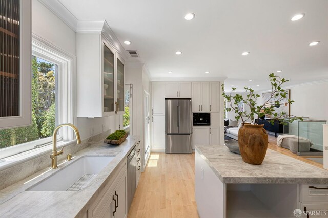 803 Vermont St, San Francisco, CA 94107 - kitchen featuring appliances with stainless steel finishes, recessed lighting, white cabinets, glass insert cabinets, and crown molding