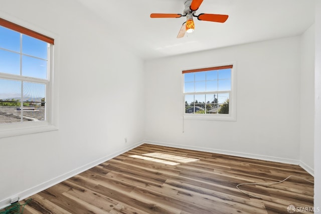556 Cherry Ave, San Bruno, CA 94066 - unfurnished room featuring baseboards and wood finished floors