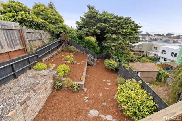 2421 Quintara St, San Francisco, CA 94116 - fenced backyard with a storage unit