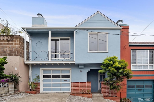 2421 Quintara St, San Francisco, CA 94116 - view of front of property featuring a garage, stucco siding, and a chimney
