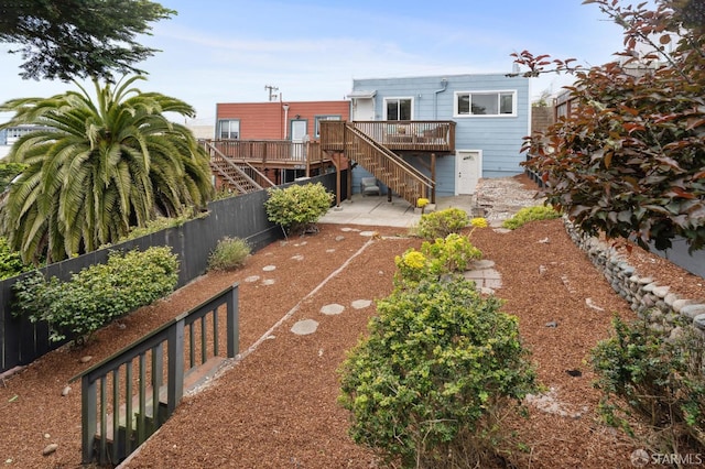2421 Quintara St, San Francisco, CA 94116 - rear view of house with stairway, a patio area, and a deck