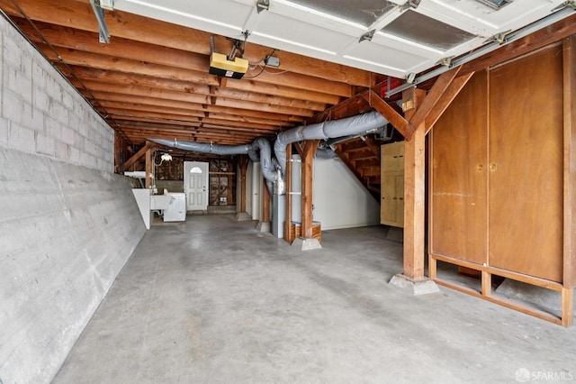2421 Quintara St, San Francisco, CA 94116 - basement featuring concrete block wall and a sink
